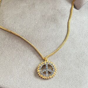 Peace out sapphire blue crystal on a chain